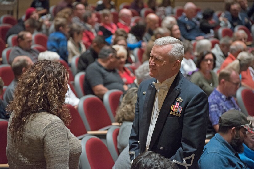 Col. Larry H. Lang, U.S. Air Force Band commander and conductor, speaks with an audience member before the band’s concert at the V. Sue Cleveland High Concert Hall in Rio Rancho, N.M., Oct. 17, 2018. For the last tour of Lang’s career, he led the band through 12 concerts at locations across New Mexico and Texas. (U.S. Air Force photo by Senior Airman Abby L. Richardson)