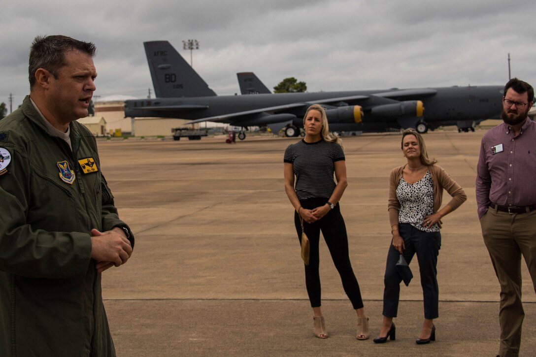 U.S. Air Force Lt. Col. William Fish speaks with local civic and business leaders at Barksdale Air Force Base, Louisiana, Oct. 9, 2018.  The visitors were on base to learn more about the mission of the 307th Bomb Wing and look for collaborative opportunities between the Barksdale AFB community and the surrounding areas.  (U.S. Air Force photo by Master Sgt. Ted Daigle)