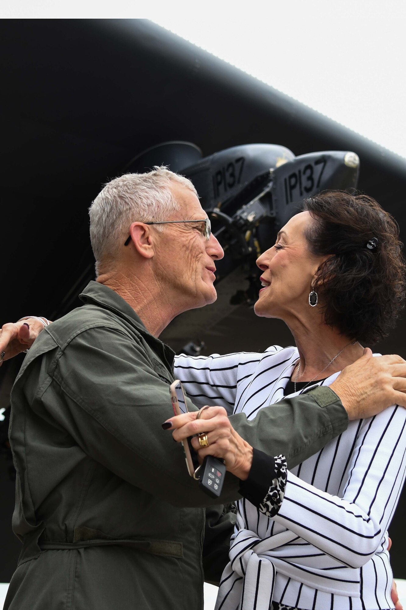 U.S. Air Force Lt. Col. Dwayne Slack, 307th Maintenance Group deputy commander, greets his wife, Cathi, on the flight line at Barksdale Air Force Base, Louisiana, Oct. 24, 2018.  Slack, who is retiring this December after more than 30 years of service, had just completed an incentive flight on a B-52 Stratofortress. (U.S. Air Force photo by Master Sgt. Ted Daigle)