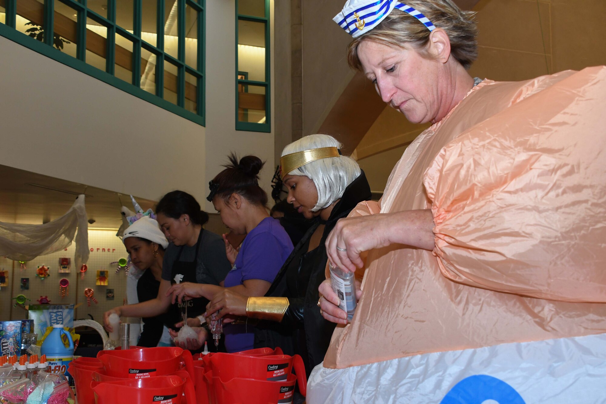 Citizen Reserve Airman from Barksdale Air Force Base prepare a Halloween slime party for patients of the Shriners Hospital for Children in Shreveport, Louisiana, Oct. 25, 2018.  The Airmen teamed up with Air Force family members and employees of Margartaville Resort Casino to bring the children a day of treats, games, and crafts. (U.S. Air Force photo by Master Sgt. Ted Daigle)
