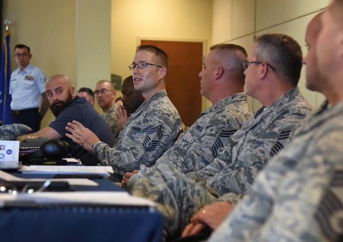 U.S. Air Force Chief Master Sgt. Joseph Berberich, 382nd Training Squadron superintendent, Fort Sam Houston, Texas, engages in a discussion with attendees during the 2nd Air Force Training Group Superintendent Summit at Keesler Air Force Base, Mississippi, Oct. 30, 2018. The two-day summit allowed training group senior enlisted leaders to share their missions and identify challenges and best practices that could be implemented throughout the command. (U.S. Air Force photo by Kemberly Groue)