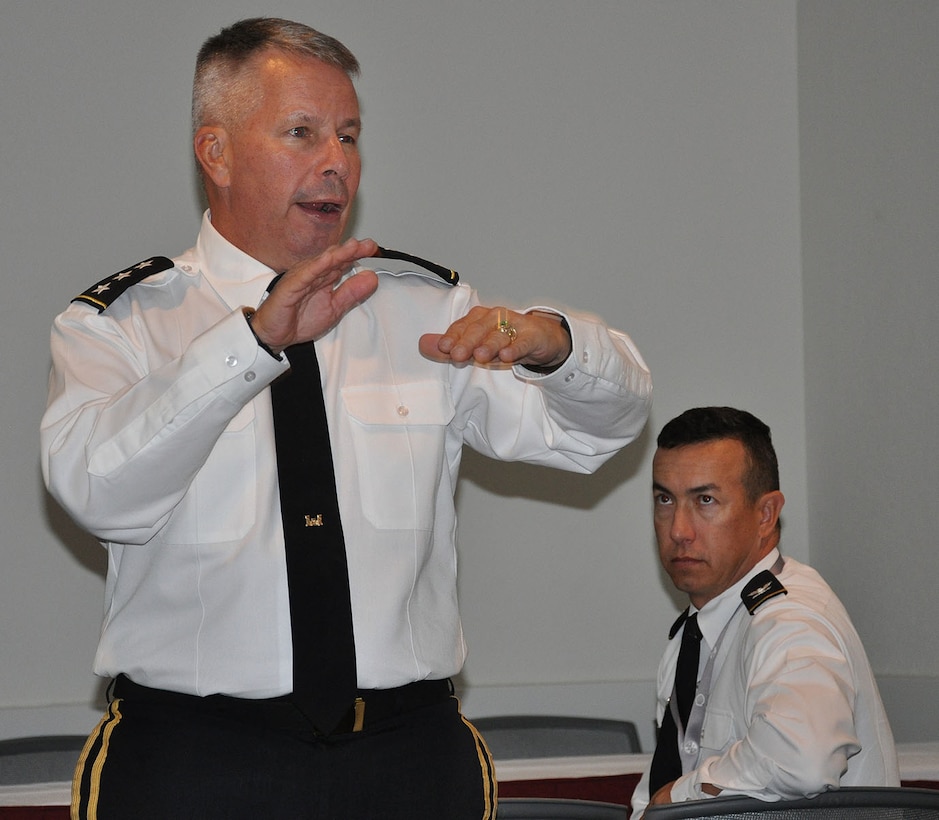 Col. Aaron Barta, U.S. Army Corps of Engineers Los Angeles District commander, right, listens to Lt. Gen. Todd Semonite, commanding general of the U.S. Army Corps of Engineers, left, talk about talent management, delivering the program and revolutionizing the Corps during a town hall meeting Oct. 18 at the Hispanic Engineer National Achievement Awards Conference in Pasadena, California.