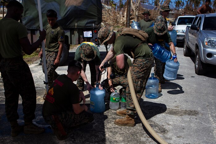 Marines with the 31st Marine Expeditionary Unit and Combat Logistics Battalion 31 pump purified water for citizens of Tinian, Commonwealth of the Northern Mariana Islands, Oct. 31, 2018. Marines with the 31st MEU and CLB-31 arrived on Tinian Oct. 29-30 in the wake of Super Typhoon Yutu as part of the U.S. Defense Support of Civil Authorities here. The Marines can purify more than 20-thousand gallons of sea water each day to meet the urgent needs of the people of Tinian. The Marines arrived at the request of CNMI officials and the U.S. Federal Emergency Management Agency to assist relief efforts in the wake of Yutu, the largest typhoon to ever hit a U.S. territory. The 31st MEU, the Marine Corps’ only continuously forward-deployed MEU, provides a flexible force ready to perform a wide-range of military operations across the Indo-Pacific region. (U.S. Marine Corps photo by Gunnery Sgt. T. T. Parish/Released)