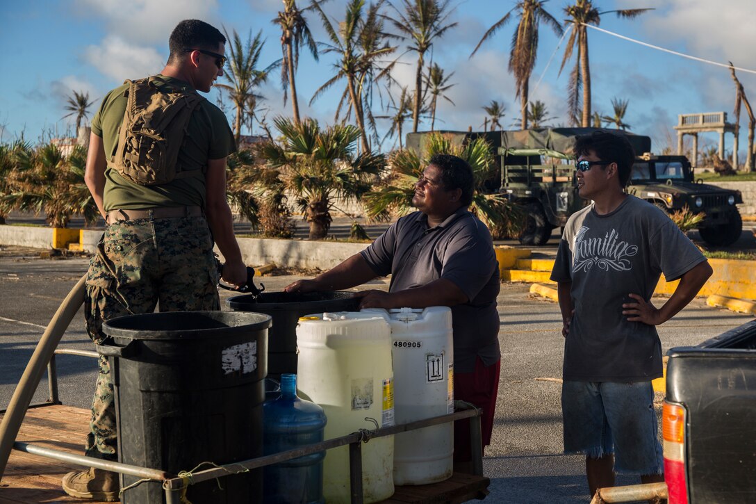 Lance Cpl. Eric Russell, a basic water support technician with Combat Logistics Battalion 31, pumps purified water for citizens of Tinian, Commonwealth of the Northern Mariana Islands, Oct. 31, 2018. Russell, a native of Muskegon, Michigan, graduated from Oakridge High School in June 2017 before enlisting in November the same year. Marines with the 31st Marine Expeditionary Unit and CLB-31 arrived on Tinian Oct. 29-30 in the wake of Super Typhoon Yutu as part of the U.S. Defense Support of Civil Authorities here. The Marines arrived at the request of CNMI officials and the U.S. Federal Emergency Management Agency to assist relief efforts in the wake of Yutu, the largest typhoon to ever hit a U.S. territory. The 31st MEU, the Marine Corps’ only continuously forward-deployed MEU, provides a flexible force ready to perform a wide-range of military operations across the Indo-Pacific region. (U.S. Marine Corps photo by Lance Cpl. Hannah Hall/Released)