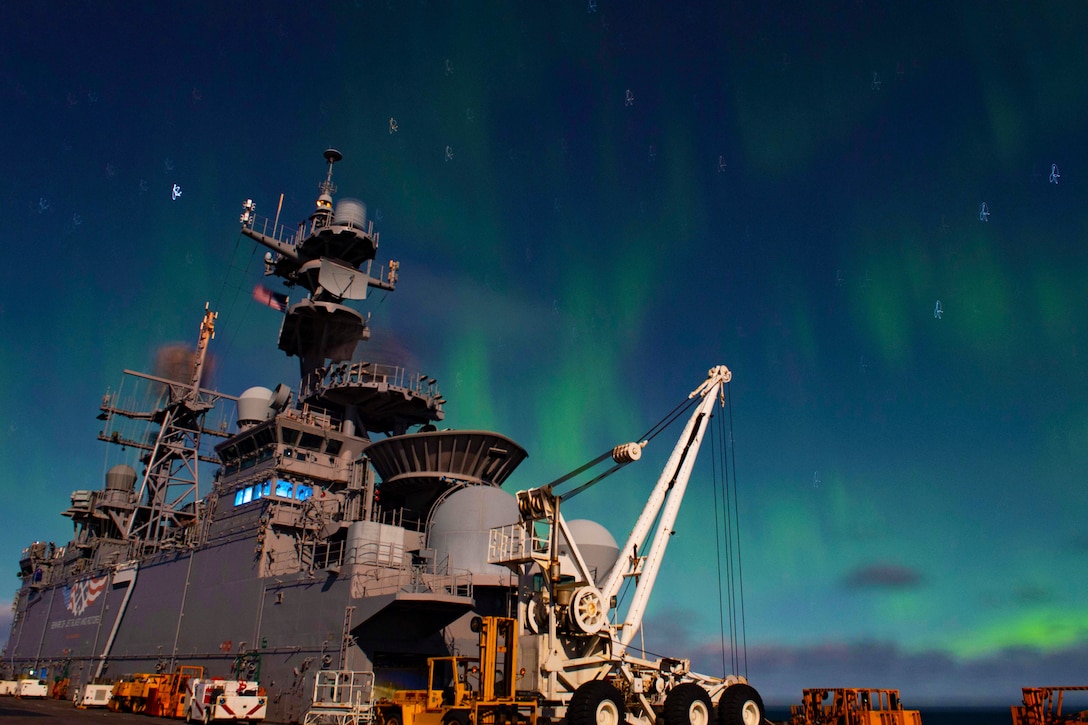 A ship is seen under the northern lights.