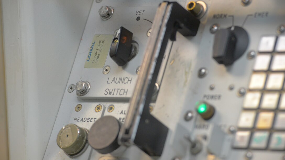 A console with a knob labeled “launch switch.”