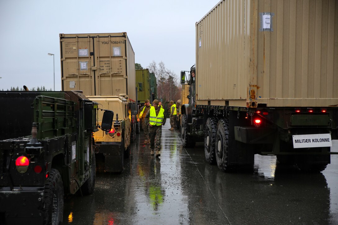 .S. Marines with II Marine Support Battalion, II Marine Information Group get accountability of vehicles during a convoy operation for Exercise Trident Juncture 18 in Norway, Nov. 2, 2018. Trident Juncture 18 demonstrates II Marine Expeditionary Force’s ability to deploy, employ, and redeploy the Marine Air Ground Task Force while improving interoperability with NATO allies and partners. (U.S. Marine Corps photo by Cpl. Patrick Osino)