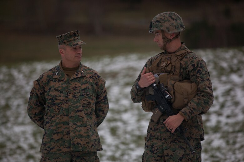 U.S. Marine Corps Maj. Gen. David Furness, the commanding general of 2nd Marine Division, speaks with Capt. Jeffery Heart, commanding officer of Bridge Company, 8th Engineer Support Battalion, 2nd Marine Logistics Group-Forward, during a bridging operation as part of Trident Juncture 18 near Voll, Norway, on Oct. 29, 2018. The bridge construction enables ground units to complete a gap crossing during the exercise, which is one of the general engineering tasks 2nd MLG provides to the Marine Air-Ground Task Force. Trident Juncture 18 enhances the U.S. and NATO Allies’ and partners’ abilities to work together collectively to conduct military operations under challenging conditions. (U.S. Marine Corps photo by Lance Cpl. Scott R. Jenkins)