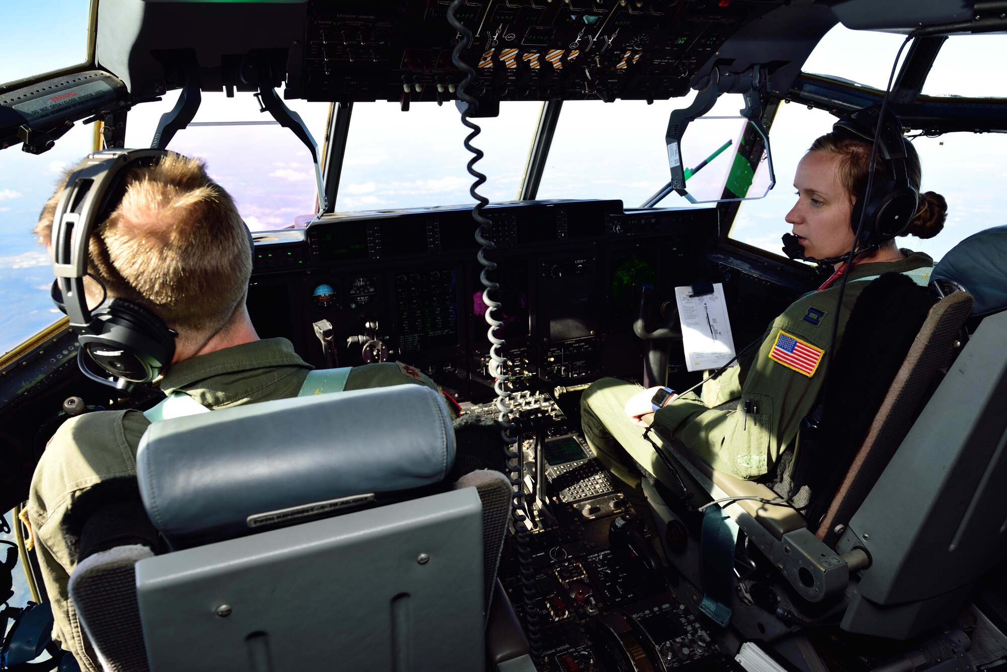 Maj. Jake Johnson and Capt. Leesa Freolich, pilots with the 815th Airlift Squadron, transport and “injured” patient from Camp Shelby to Keesler Air Force Base, Mississippi, during an exercise Nov. 4, 2018. The 403rd Wing, of which the 815th AS is a part, participated in an exercise during the November 2018 Unit Training Assembly to test their ability to survive and operate in a deployed environment. (U.S. Air Force photo by Tech. Sgt. Ryan Labadens)