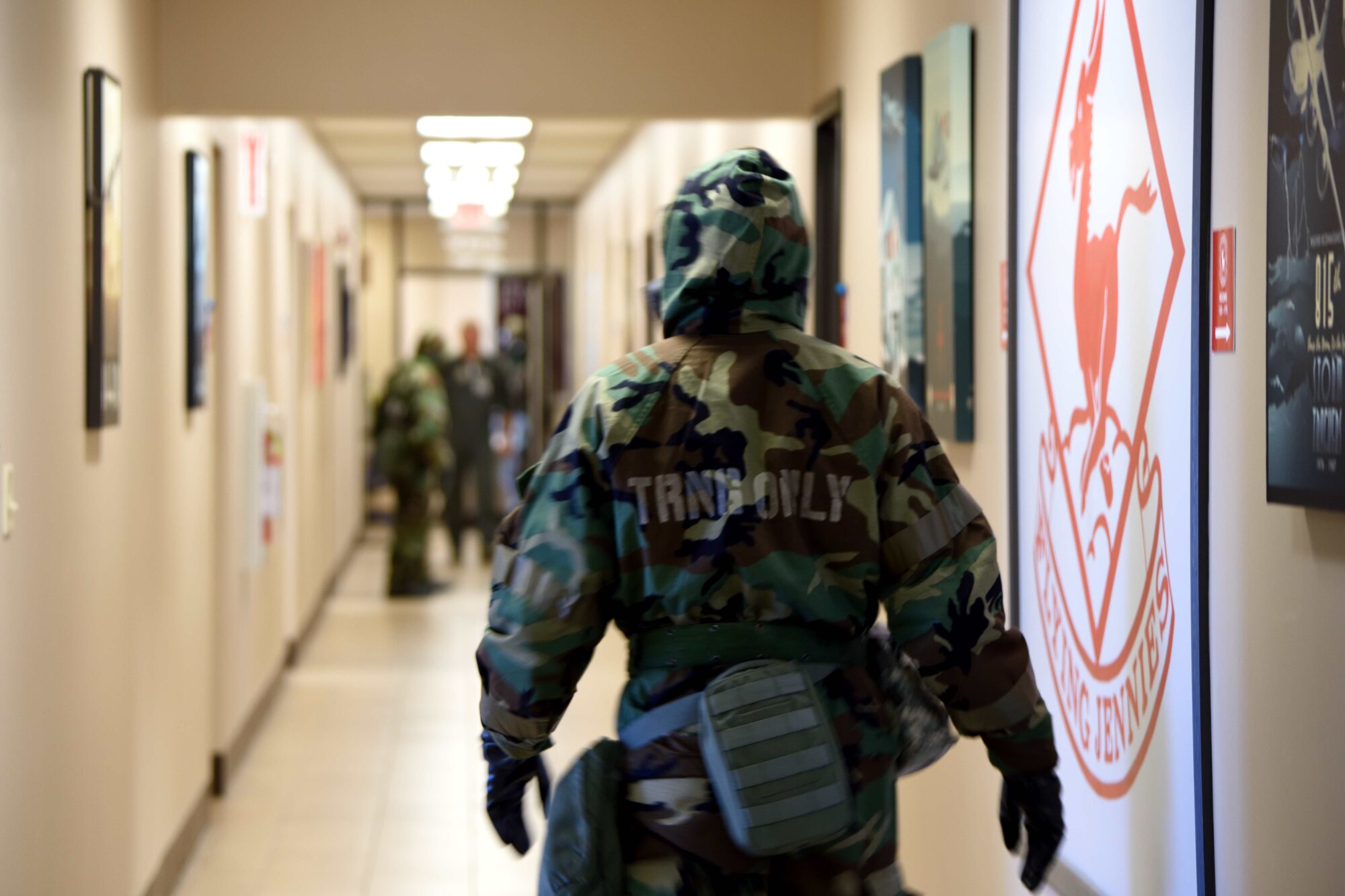 403rd Wing members donned mission oriented protective posture gear, or MOPP gear, during an exercise Nov. 4, 2018, at Keesler Air Force Base, Mississippi. The 403rd Wing participated in an exercise to during the November 2018 Unit Training Assembly to test their ability to survive and operate in a deployed environment. (U.S. Air Force photo by TLt. Col. Marnee A.C. Losurdo)