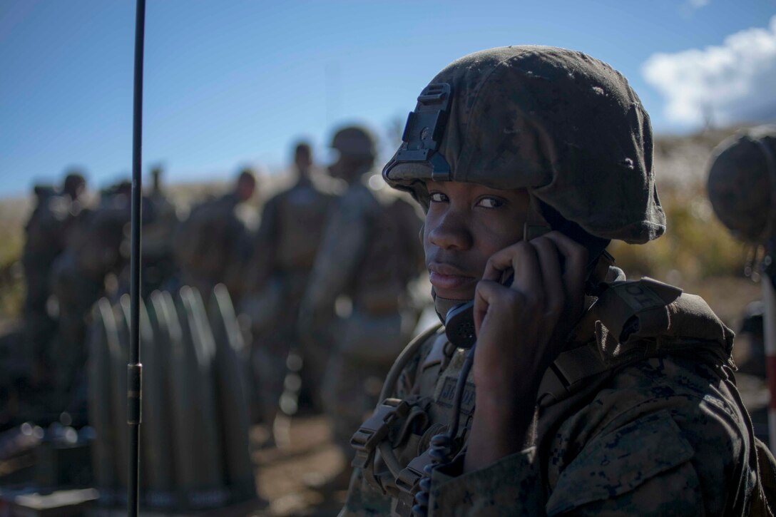 Lance Cpl. Jacob Brown, a field artillery Marine, with 3rd Battalion, 12th Marine Regiment, communicates coordinates to the section chief and other Marines in his sections during Artillery Relocation Training Program 18-3 October 27, 2018, on the Combined Arms Training Complex, Camp Fuji, Japan.  ARTP 18-3 allows Marines with 3rd Battalion, 12th Marine Regiment, 3rd Marine Division, III Marine Expeditionary Force, based off of Camp Hansen Okinawa, Japan to sharpen their understanding for their job field. Brown is a native of the Bronx, New York.