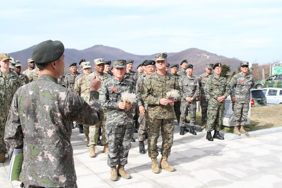 CAMP HUMPHREYS, Republic of Korea – Senior enlisted leaders from all branches of U.S. and Republic of Korea militaries muster during the Senior Enlisted Leader Symposium near the Northwest shore of Korea here, Oct. 22. The senior leaders engaged in formations near the demilitarized zone, visited historical Korean War sites, and discussed the history of the events that unfolded there. (U.S. Army photo by Staff Sgt. Mark A. Kauffman/Released)