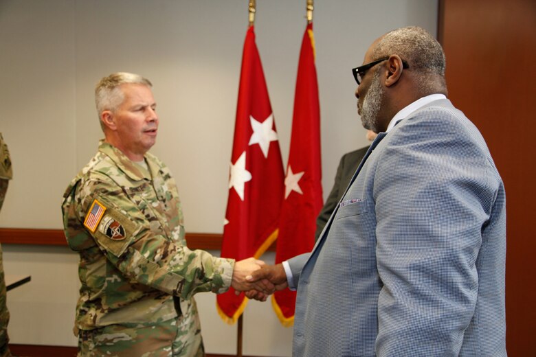 Lt. Gen. Todd Semonite, the 54th Chief of Engineers and Commanding General of the U.S. Army Corps of Engineers greeted Arthur Saulsberry, Small Business Deputy for the Kansas City District, after a Town Hall Meeting in Kansas City October 24, 2018.
