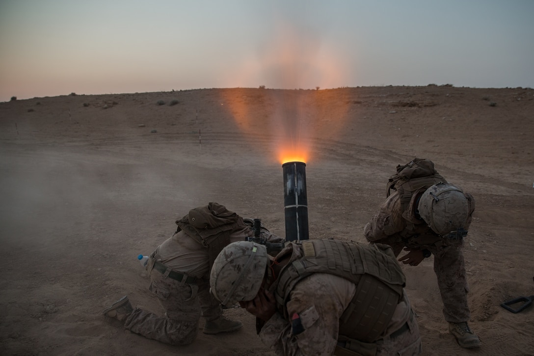 U.S. Marines with Weapons Company, 3rd Battalion, 7th Marine Regiment, attached to Special Purpose Marine Air-Ground Task Force, Crisis Response-Central Command fire 120mm mortars in support of Combined Joint Task Force – Operation Inherent Resolve operations Sept. 18, 2018. CJTF-OIR is the military arm of the Global Coalition to defeat ISIS in designated parts of Iraq and Syria.
