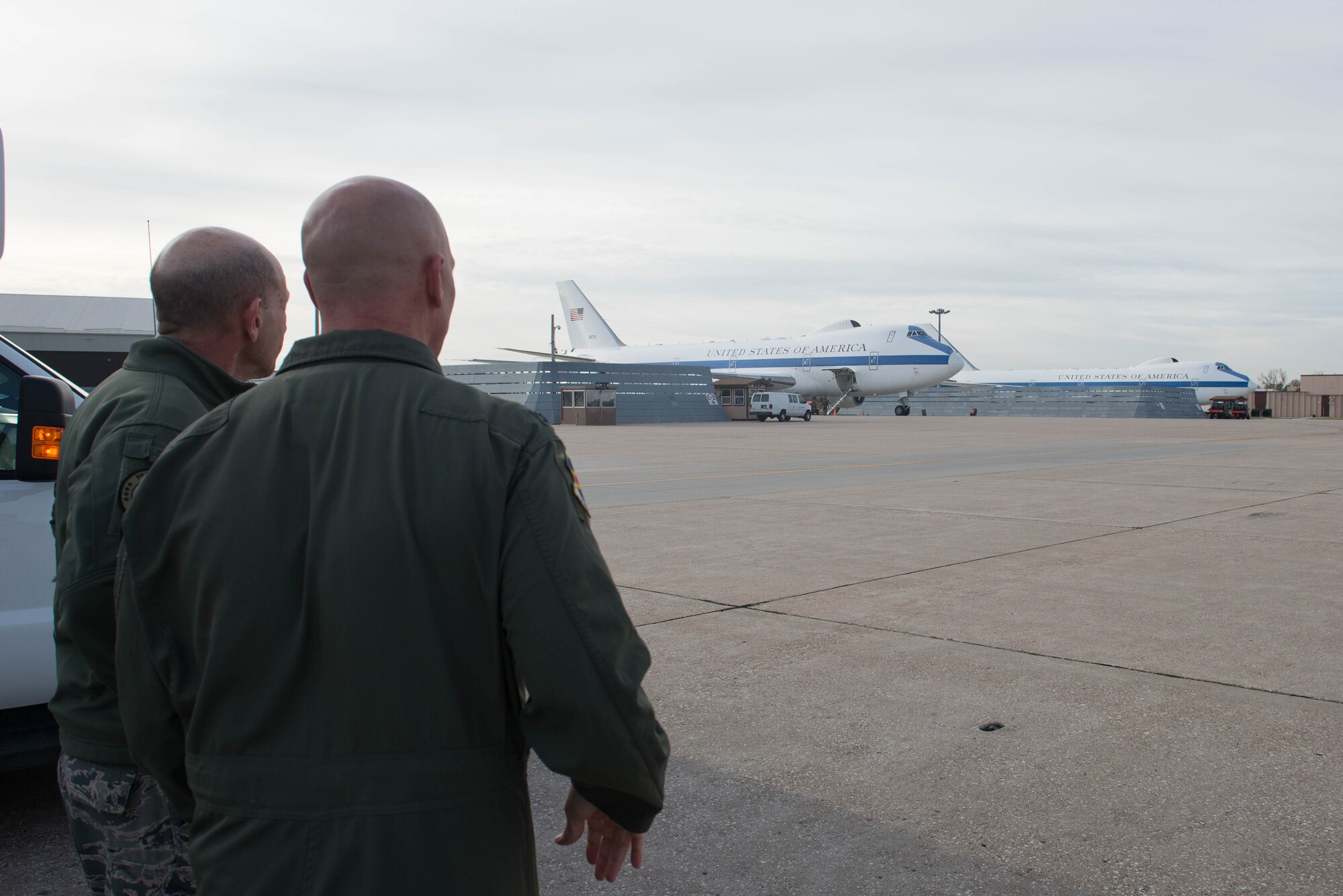 U.S. Air Force Col. Michael Manion, right, 55th Wing commander, and Gen. Mike Holmes, the commander of Air Combat Command, walk the flight line Oct. 30, 2018, at Offutt Air Force Base, Nebraska.