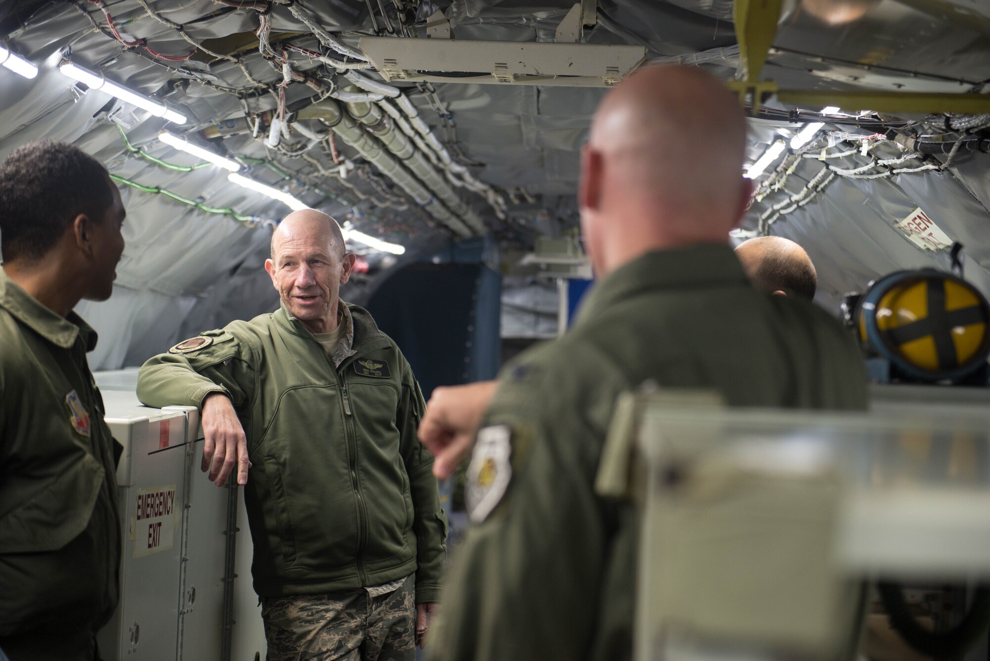 U.S. Air Force Gen. Mike Holmes, the commander of Air Combat Command, receives a tour of an RC-135V/W Rivet Joint Oct. 30, 2018, at Offutt Air Force Base, Nebraska.