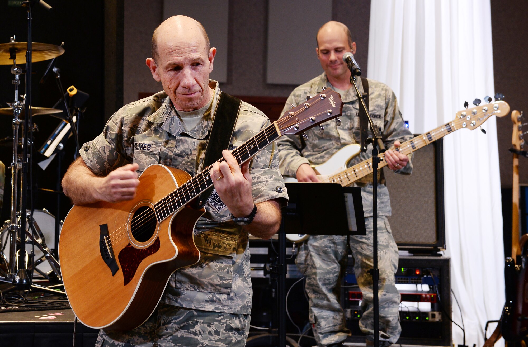 U.S. Air Force Gen. James Holmes, Air Combat Command commander, plays the guitar with the U.S. Heartland of America Band Oct. 31, 2018, inside the band’s concert hall at Offutt Air Force Base, Nebraska.