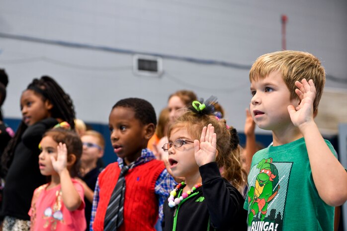Kids from Joint Base Charleston give a drug-free pledge Oct. 23, 2018 at the youth center at Joint Base Charleston, S.C. October 23rd kicked off Red Ribbon Week, which is a week-long drug prevention and awareness program. As a part of the base’s efforts to take care of service members and their families, drug demand reduction program held several events to educate military youth.