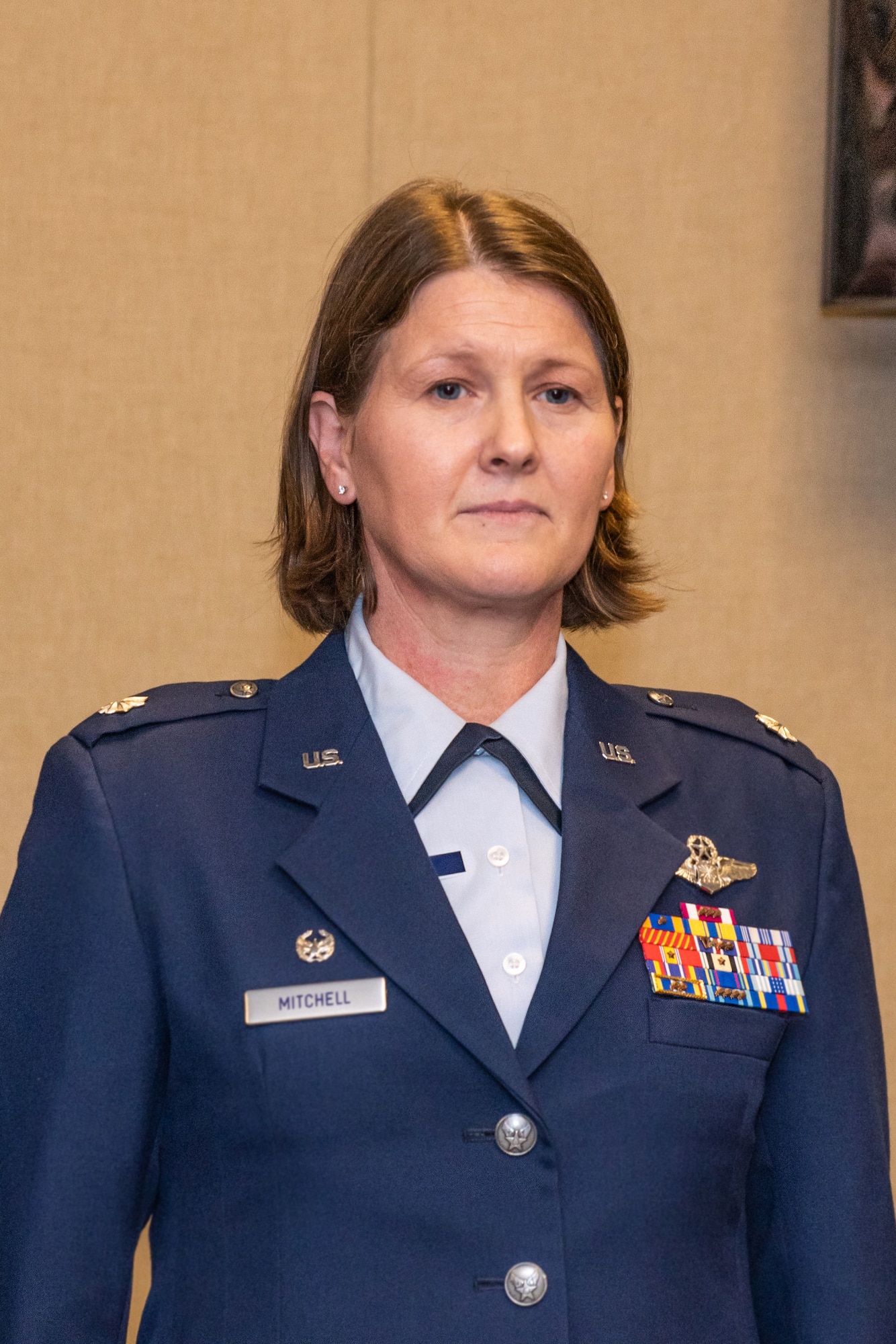 U.S. Air Force Lt. Col. Joanna Mitchell, 307th Operations Support Squadron commander, stands at attention during a change of command ceremony for the unit at Barksdale Air Force Base, Louisiana, Nov. 3, 2018.  Mitchell has more than 2300 flight hours, including 273 combat hours. She holds two three degrees and is a graduate of the Air War College. (U.S. Air Force photo by Tech. Sgt. Cody Burt)