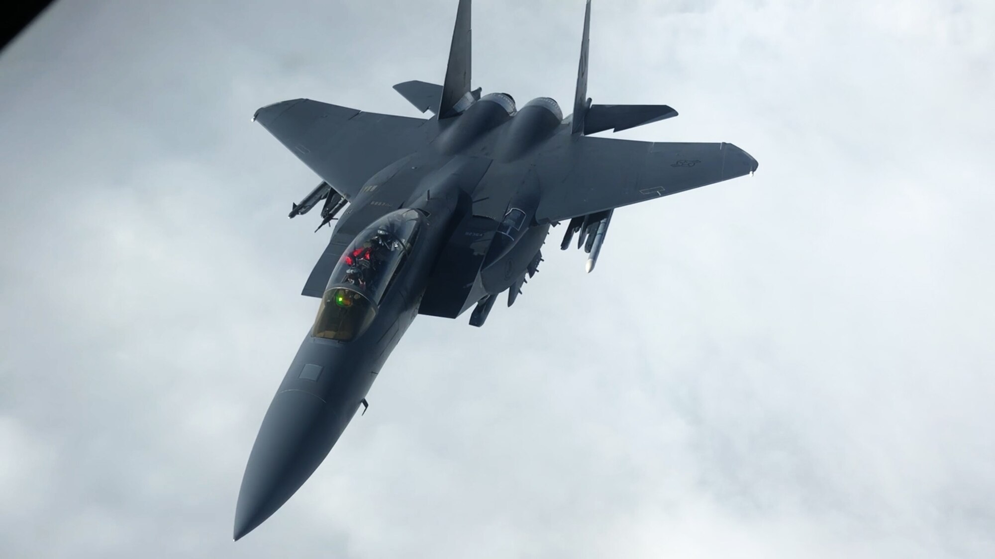 A U.S. Air Force F-15E Strike Eagle with the 48th Fighter Wing from RAF Lakenheath, England, flies behind a U.S. Air Force KC-135 Stratotanker with the 100th Air Refueling Wing from RAF Mildenhall, England, during a deployment to Ӓmari Air Base, Estonia Nov. 1, 2018. Continual interaction between the U.S. and Estonia strengthens overall coordination during times of crisis or security threats. (U.S. Air Force photo by Senior Airman Kelly O’Connor)