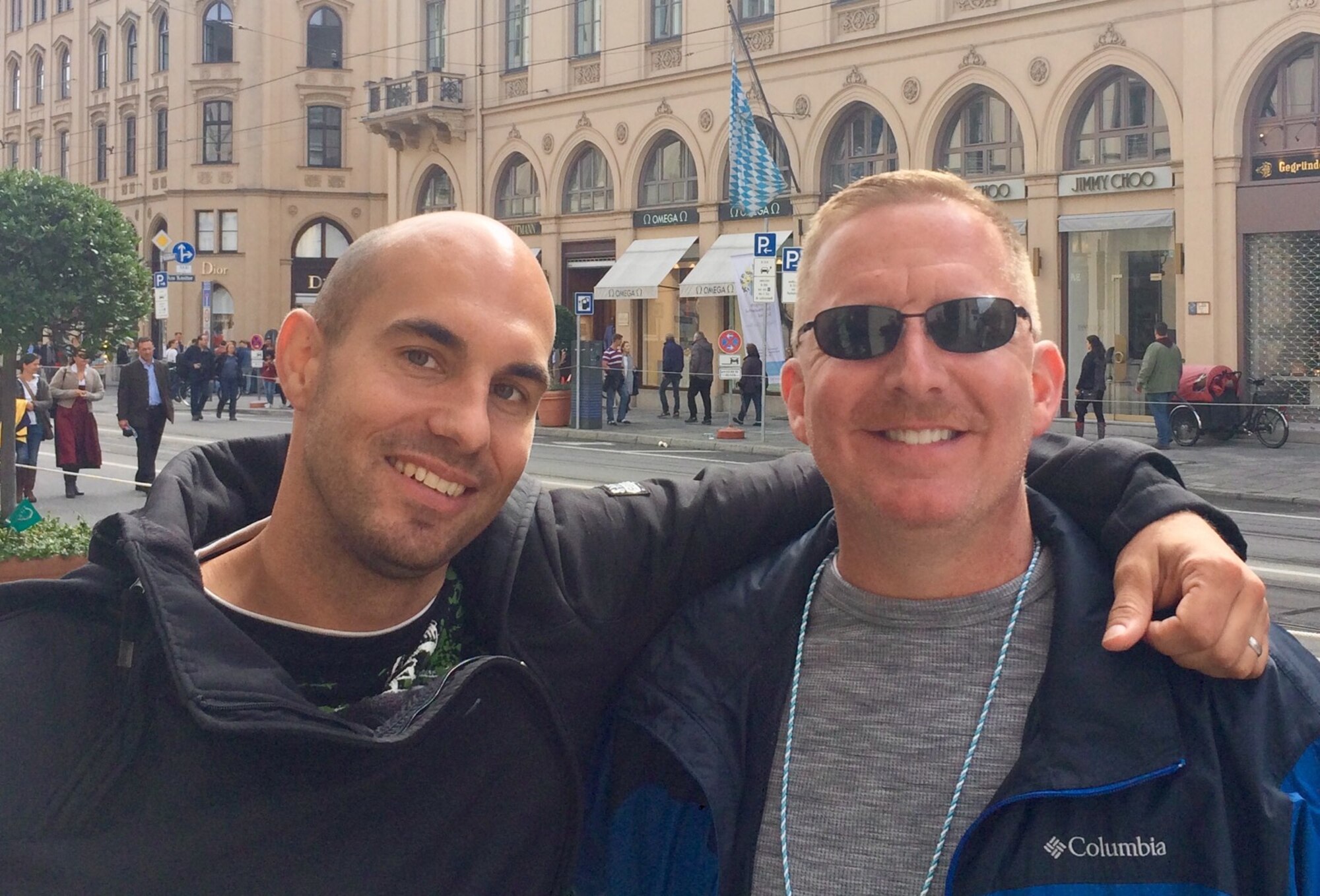 Lt. Col. Teddy Wundenberg, a maintenance officer for Helicopter Wing 64 of the German Air Force, and Maj. Christopher Tusing, 167th Logistics Readiness Squadron commander, pose for a photo in Munich, Germany during an Oktoberfest parade. Tusing spent about two weeks in Germany with Wundenberg as part of the Military Reserve Exchange Program.