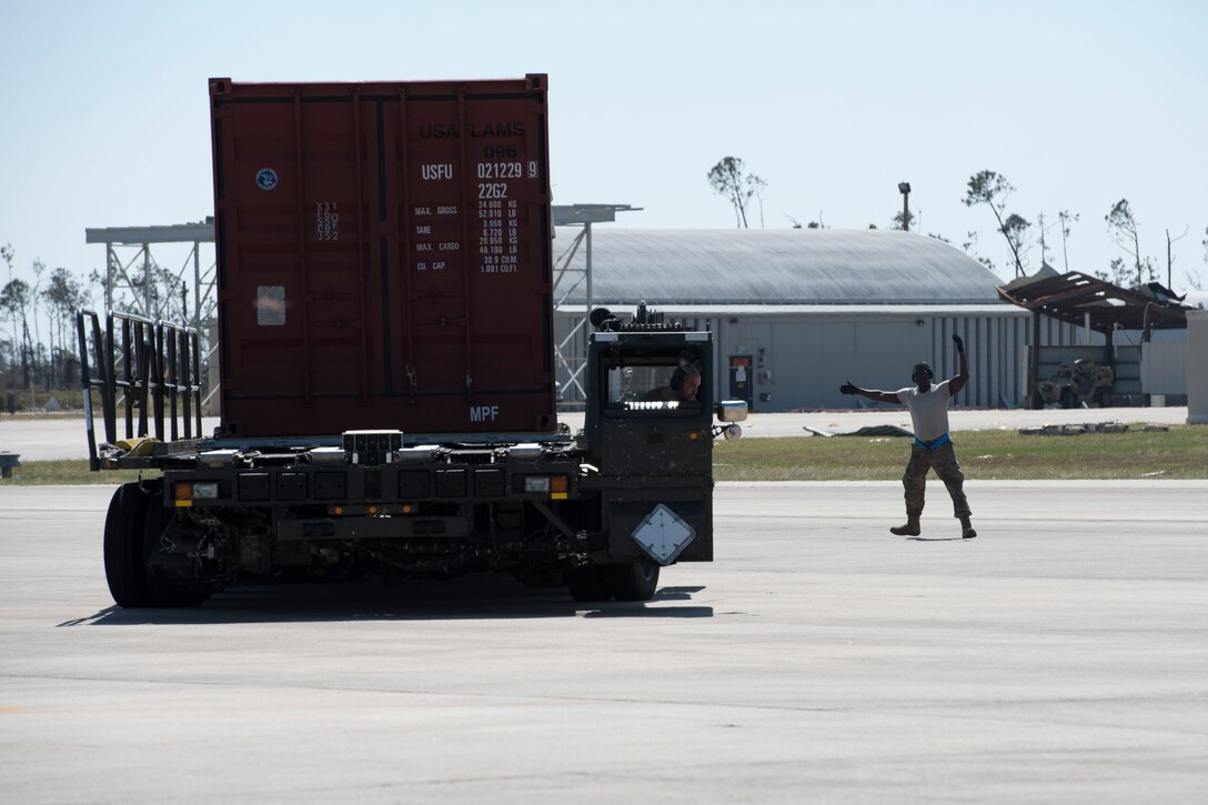 A C-17 Globemaster III operated by the 167th Airlift Wing transported six generators and a Large Area Maintenance Shelter (LAMS) from the 635th Materiel Maintenance Squadron based at Holloman Air Force Base N.M., to Tyndall Air Force Base, Fla., Oct. 18, 2018. The C-17 air crew, with assistance from the 635th MMS, loaded the cargo Oct. 17. The following day the cargo was unloaded at Tyndall AFB with the assistance of a contingency response team from the 821st Contingency Response Group, Travis AFB, Calif. Tyndall AFB took a direct hit from Hurricane Michael, which made landfall as a category 4 storm on Oct. 10. The 635th Materiel Maintenance Group is the Air Force’s only organic Basic Expeditionary Airfield Resources (BEAR) unit. The Group is responsible for the storage, inspection, repair, deployment, and accountability of BEAR assets belonging to Air Force Materiel Command and Air Combat Command. (U.S. Air National Guard photo by Senior Master Sgt. Emily Beightol-Deyerle)