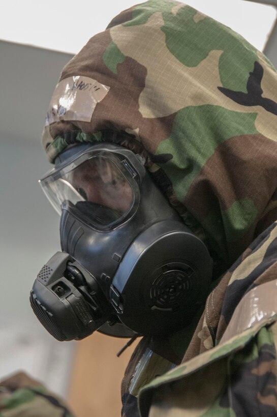 Members of the 104th Fighter Wing participated in a Phase II exercise November 3, 2018, at Barnes Air National Guard base, Westfield, Massachusetts. Colonel Pete Green, commander of the 104th FW, convened a Crisis Action Team consisting of group-level commanders and other pertinent subject-matter experts. During Alarm Black, Mission Oriented Protective Posture four, members of the CAT team worked together to get their gear on safe and securely in under two minutes.  (U.S. Air National Guard photo/ 2Lt. Amelia Leonard. Cleared for public release)