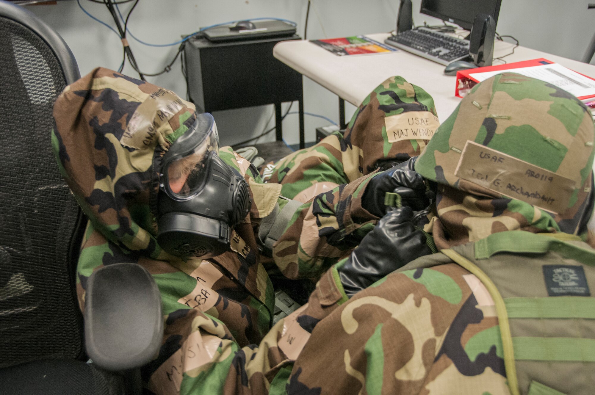 Members of the 104th Fighter Wing participated in a Phase II exercise November 3, 2018, at Barnes Air National Guard base, Westfield, Massachusetts. Colonel Pete Green, commander of the 104th FW, convened a Crisis Action Team consisting of group-level commanders and other pertinent subject-matter experts. During Alarm Black, Mission Oriented Protective Posture four, members of the CAT team worked together to get their gear on safe and securely in under two minutes.  (U.S. Air National Guard photo/ 2Lt. Amelia Leonard. Cleared for public release)
