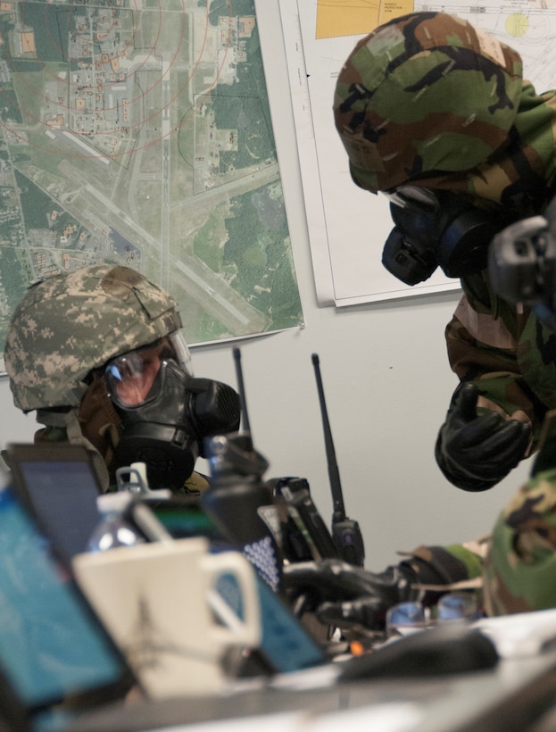 Members of the 104th Fighter Wing participated in a Phase II exercise November 3, 2018, at Barnes Air National Guard base, Westfield, Massachusetts. Colonel Pete Green, commander of the 104th FW, convened a Crisis Action Team consisting of group-level commanders and other pertinent subject-matter experts. During Alarm Black, Mission Oriented Protective Posture four, members of the CAT team worked together to get their gear on safe and securely in under two minutes.  (U.S. Air National Guard photo/ 2Lt. Amelia Leonard. Cleared for public release)