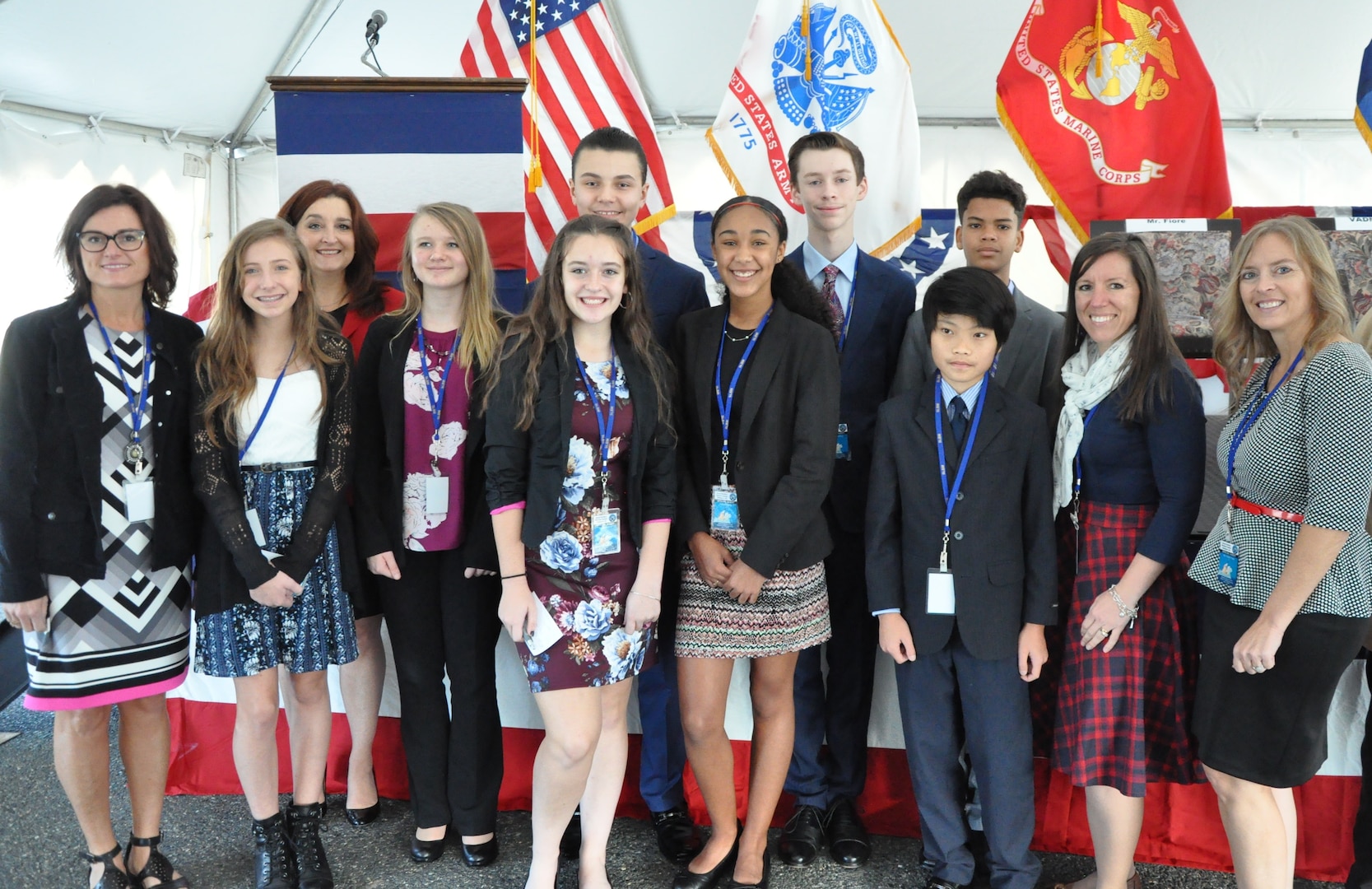 IMAGE: DAHLGREN, Va. (Nov. 1, 2018) – Spotsylvania Post Oak Middle School science, technology, engineering, and mathematics (STEM) students, their teachers, and a Naval Surface Warfare Center Dahlgren Division (NSWCDD) STEM mentor are pictured prior to a ribbon-cutting ceremony for the Navy’s new Missile Support Facility. The building features state-of-the-art labs, offices, and equipment for more than 300 NSWCDD Strategic and Computing Systems Department scientists, engineers, and technical experts who develop, test, and maintain the Submarine Launched Ballistic Missile fire control and mission planning software.  (U.S. Navy photo/Released)