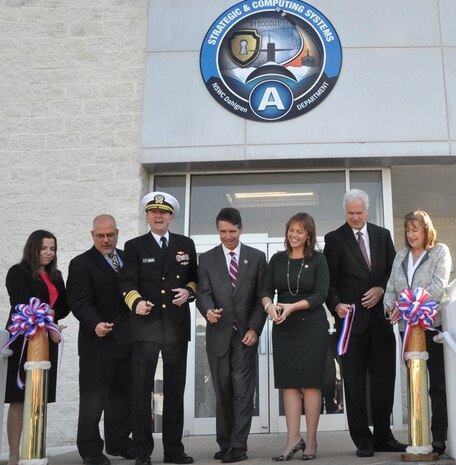 IMAGE: DAHLGREN, Va. (Nov. 1, 2018) - Navy leaders and scientists are joined by local officials at the ribbon cutting ceremony for the new Naval Surface Warfare Center Dahlgren Division (NSWCDD) Missile Support Facility. The facility features state-of-the-art labs, offices, and equipment for more than 300 NSWCDD Strategic and Computing Systems Department scientists, engineers, and technical experts who develop, test, and maintain the Submarine Launched Ballistic Missile fire control and mission planning software. From left to right: Lauren Falkenstein, a scientist representing the NSWCDD Strategic and Computing Systems Department's newly-hired junior workers; John Fiore, NSWCDD technical director; Vice Adm. Johnny Wolfe, director of Navy Strategic Systems Programs; U.S. Rep. Rob Wittman; Margaret Ransone, Virginia delegate; Kyle Jones, head of the NSWCDD Strategic and Computing Systems Department; Lisa Weisbeck, a scientist representing the NSWCDD Strategic and Computing Systems Department's senior level workers.