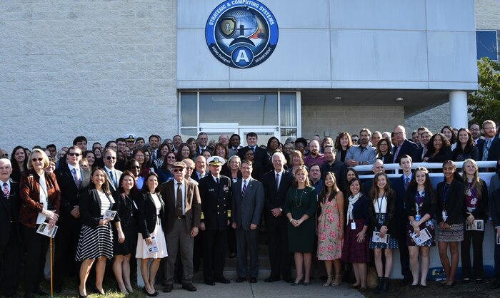 IMAGE: Naval Surface Warfare Center Dahlgren Division (NSWCDD) employees and Post Oak Middle School STEM (science, technology, engineering, and mathematics) students join Navy leaders and distinguished visitors at the ribbon-cutting ceremony for the new Missile Support Facility. The building features state-of-the-art labs, offices, and equipment for more than 300 NSWCDD Strategic and Computing Systems Department scientists, engineers, and technical experts who develop, test, and maintain the Submarine Launched Ballistic Missile fire control and mission planning software for current and future systems.