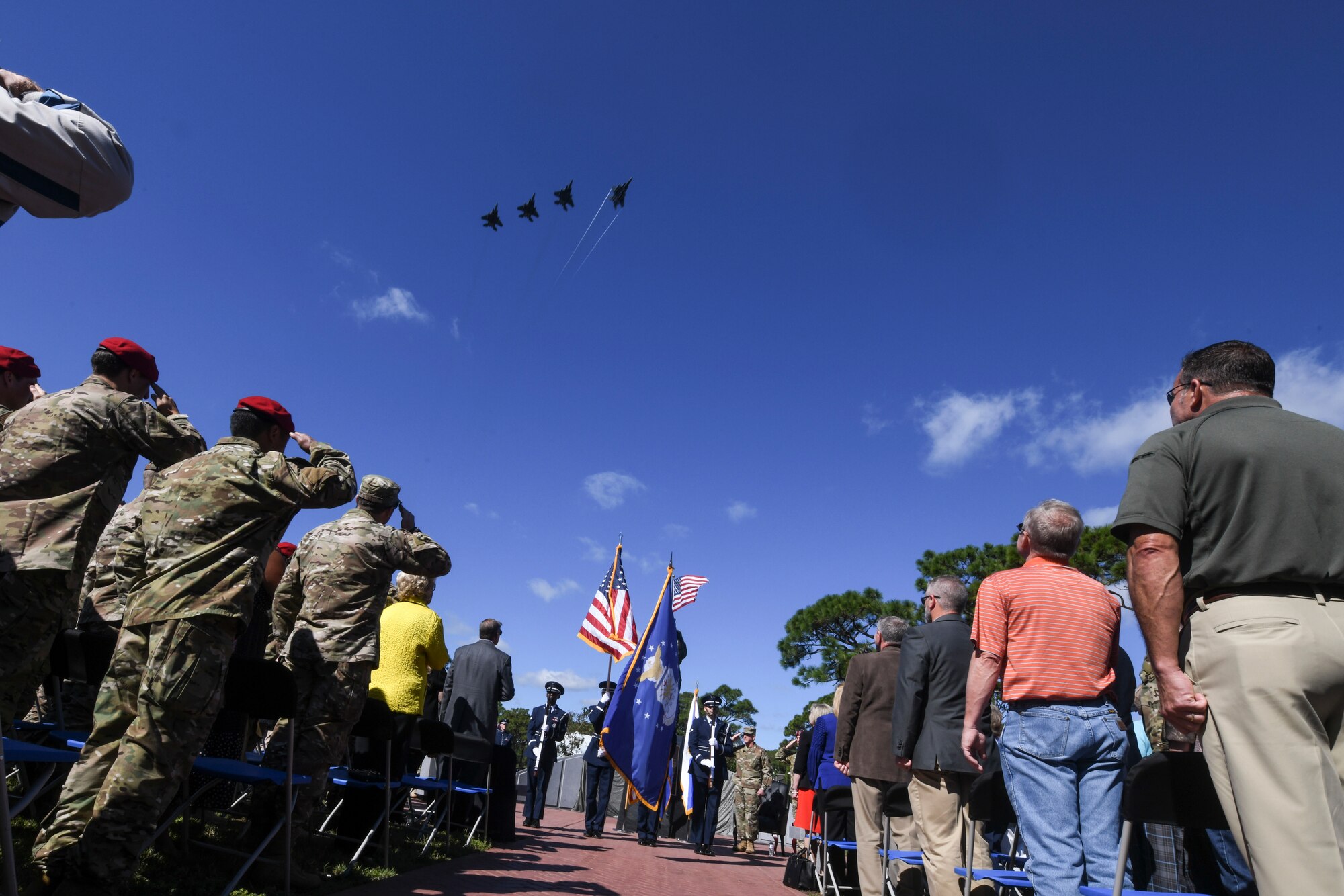 Four F-15E Strike Eagle aircraft with the 4th Fighter Wing flyover the U.S. Air Force Master Sgt. John A. Chapman Medal of Honor memorial unveiling ceremony on Oct. 27, 2018, at Hurlburt Field, Florida.