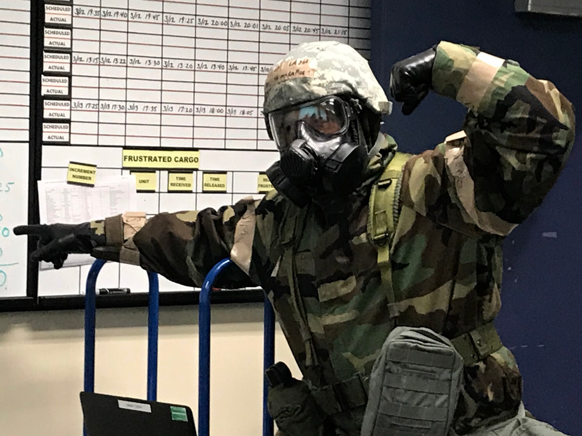 Airmen from the 104th Fighter Wing work in Mission Oriented Protective Posture level four Nov. 4, 2018, at Barnes Air National Guard Base, Massachusetts. The airmen kept morale high while working to enhance mission readiness.  (U.S. National Guard photo by Airman Basic Sara Kolinski. Cleared for public release)