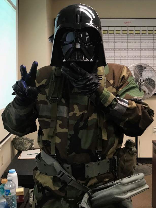 Airmen from the 104th Fighter Wing work in Mission Oriented Protective Posture level four Nov. 4, 2018, at Barnes Air National Guard Base, Massachusetts. The airmen kept morale high while working to enhance mission readiness.  (U.S. National Guard photo by Airman Basic Sara Kolinski. Cleared for public release)