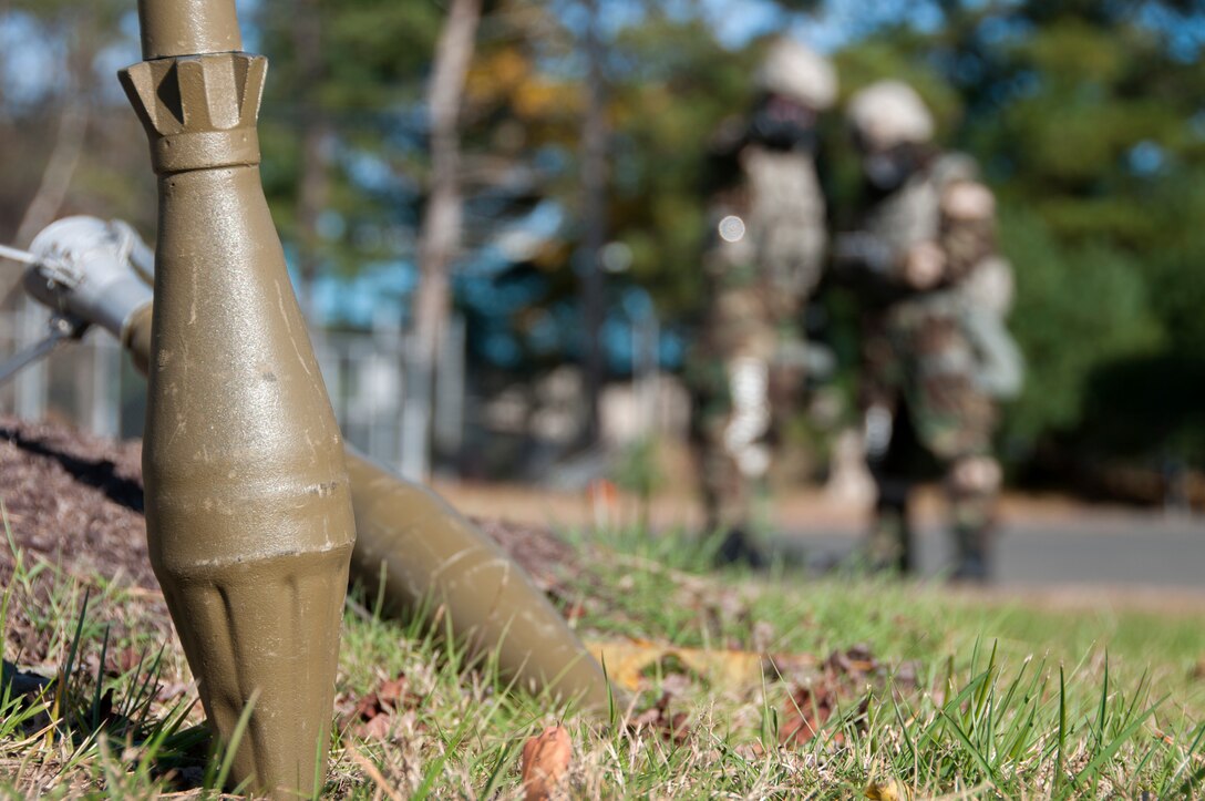 Airman 1st Class Nathaniel Chase and Airman 1st Class Josh Paquette, 104th Security Forces Squadron Defenders, participate in a Phase II exercise Nov. 4, 2018, at Barnes Air National Guard Base, Westfield, Massachusetts. The exercise allows Airmen to demonstrate the use of life-saving skills during realistic scenarios that enhance combat readiness. (U.S. Air National Guard Photo by Airman 1st Class Randall S. Burlingame)