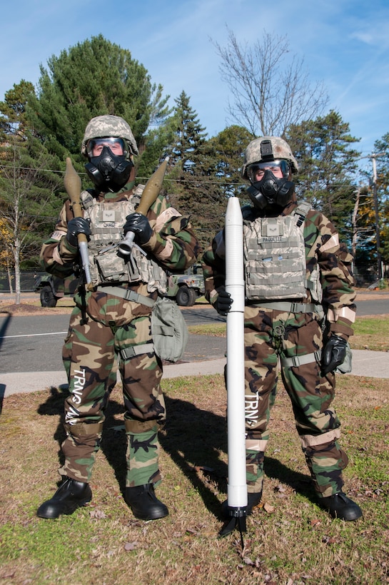 Airman 1st Class Nathaniel Chase and Airman 1st Class Josh Paquette, 104th Security Forces Squadron Defenders, participate in a Phase II exercise Nov. 4, 2018, at Barnes Air National Guard Base, Westfield, Massachusetts. The exercise allows Airmen to demonstrate the use of life-saving skills during realistic scenarios that enhance combat readiness. (U.S. Air National Guard Photo by Airman 1st Class Randall S. Burlingame)