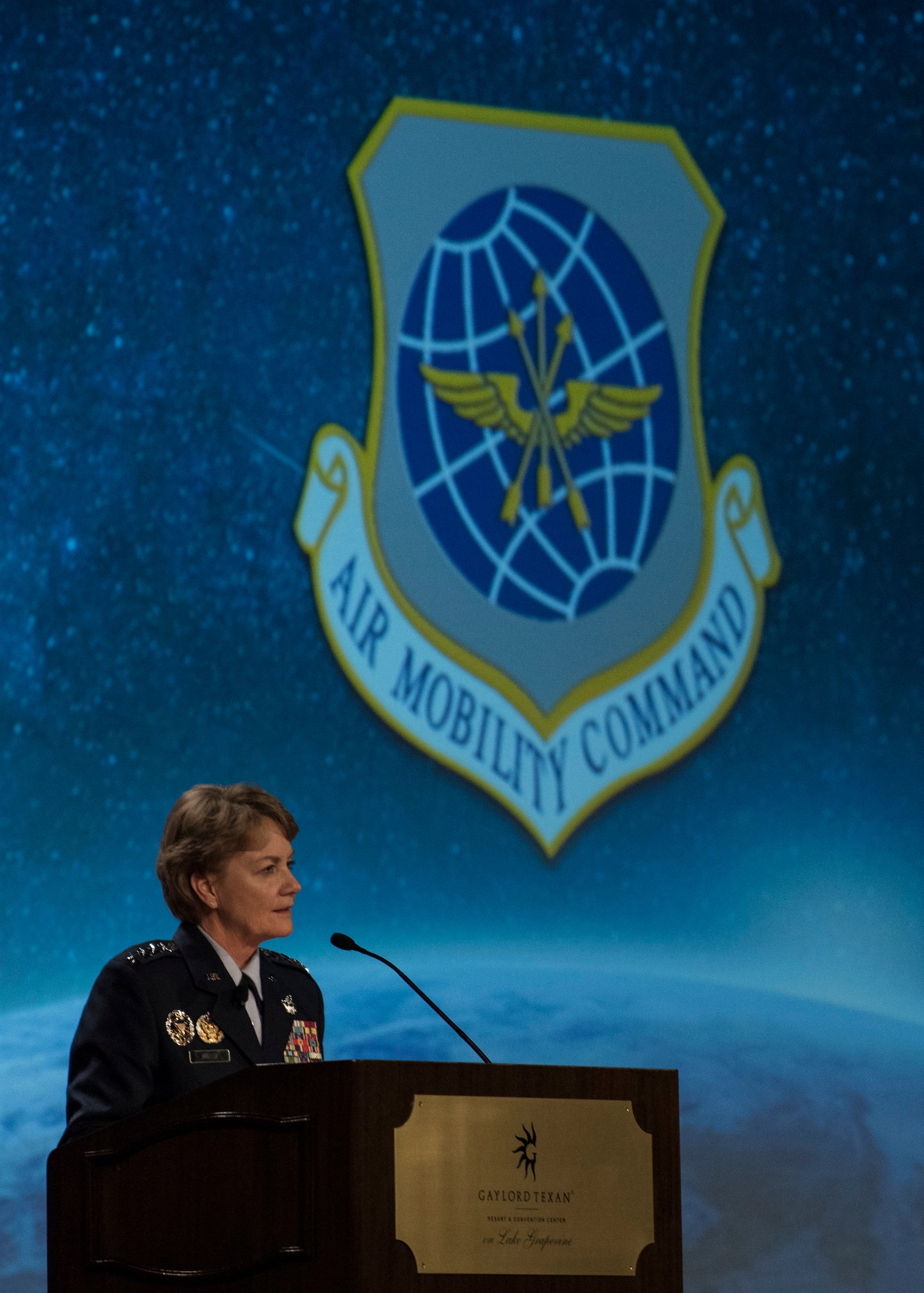 Gen. Maryanne Miller, Air Mobility Command commander, speaks during the Airlift/Tanker Association Symposium in Grapevine, Texas, Oct. 27, 2018. "As Airmen, we succeed," said Miller. "As Airmen, we invest in serving this great nation and each other. As Airmen, we lead from the
front, kneel by those in need, share in the work of our teammates, respect their lives and honor their contributions." A/TA, AMC's premier professional  development event, provides mobility Airmen an opportunity to learn about and discuss mobility priorities, issues, challenges, and successes. The venue creates dialogue between industry experts and Air Force and Department of Defense about ways to innovate, enhance mission effects and advance readiness headed into the future.  (U.S. Air Force photo by Tech. Sgt. Jodi Martinez)