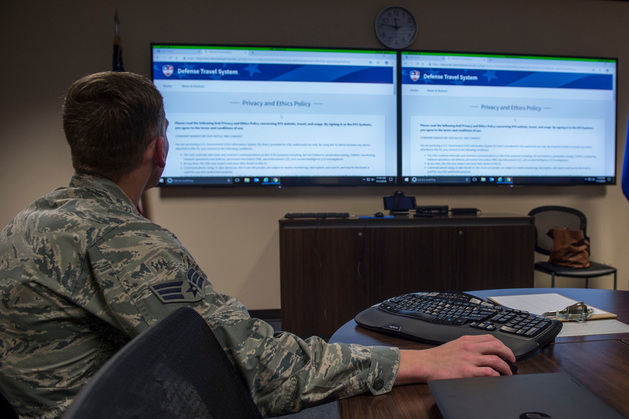 U.S. Air Force Senior Airman Brandon Bray, a financial operations technician assigned to the 97th Comptroller Squadron opens the Defense Travel System website