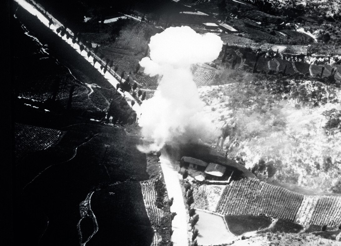 Enemy fuel truck hit by North American F-51 on highway east of Kumchon, Korea (Air and Space Museum)