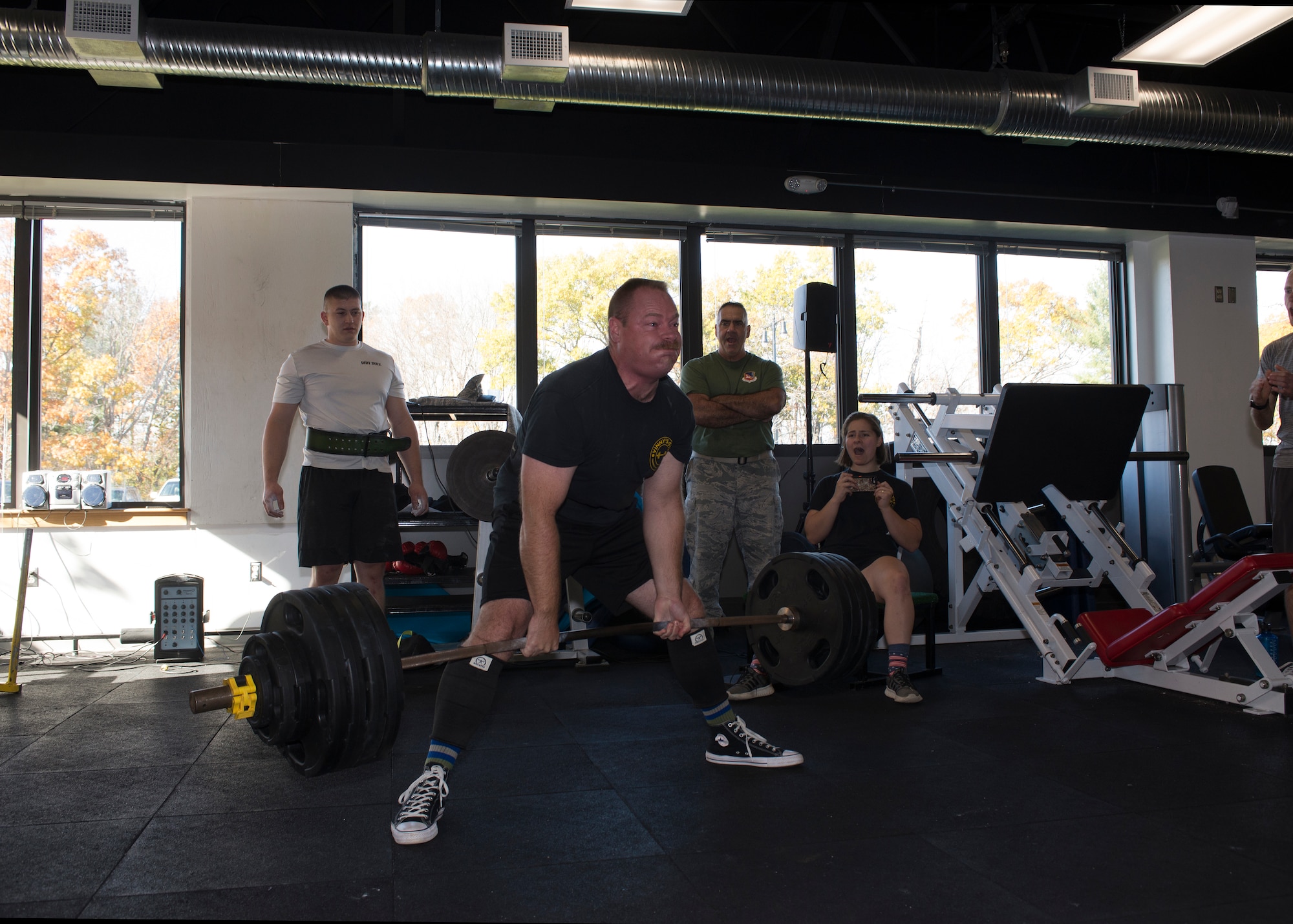Tech Sgt. Todd Scruton, a crew chief with the 157th Maintenance Group, lifts 425 pounds during the first weight lifting competition held at Pease Air National Guard Base, N.H. Nov. 4, 2018. The competition was part of the Aircraft Maintenance Squadron's commander's challenge and included squat, deadlift, bench and run components. (Photo by Airman 1st Class Victoria Nelson, 157th ARW Public Affairs)