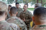 Capt. Brian Ford, commander of the 41st Route Clearance Company, 4th Engineer Battalion, 36th Engineer Brigade, speaks to his Soldiers during de-escalation of force scenario training as part of Operation Faithful Patriot at Joint Base San Antonio-Lackland Oct. 31. Soldiers are deploying in support of Operation Faithful Patriot in order to assist the Department of Homeland Security and Customs and Border Patrol officers along the south-western border of the U.S. and Mexico.