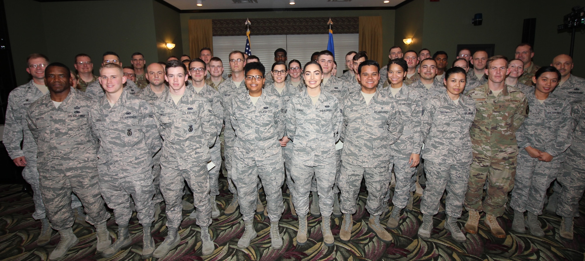 Team Wright-Patt’s newest enlisted promotees pose for a group photo following a promotion ceremony at the Wright-Patt Club, Wright-Patterson Air Force Base, Ohio, Oct. 31, 2018. (U.S. Air Force Photo/Thomas Lewis) 181031-F-ZZ000-1009