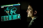 Cyber warfare operations journeyman monitors live cyber attacks on operations floor of 27th Cyberspace Squadron at Warfield Air National Guard Base, Middle River, Maryland, June 3, 2017 (U.S. Air Force/J.M. Eddins, Jr.)