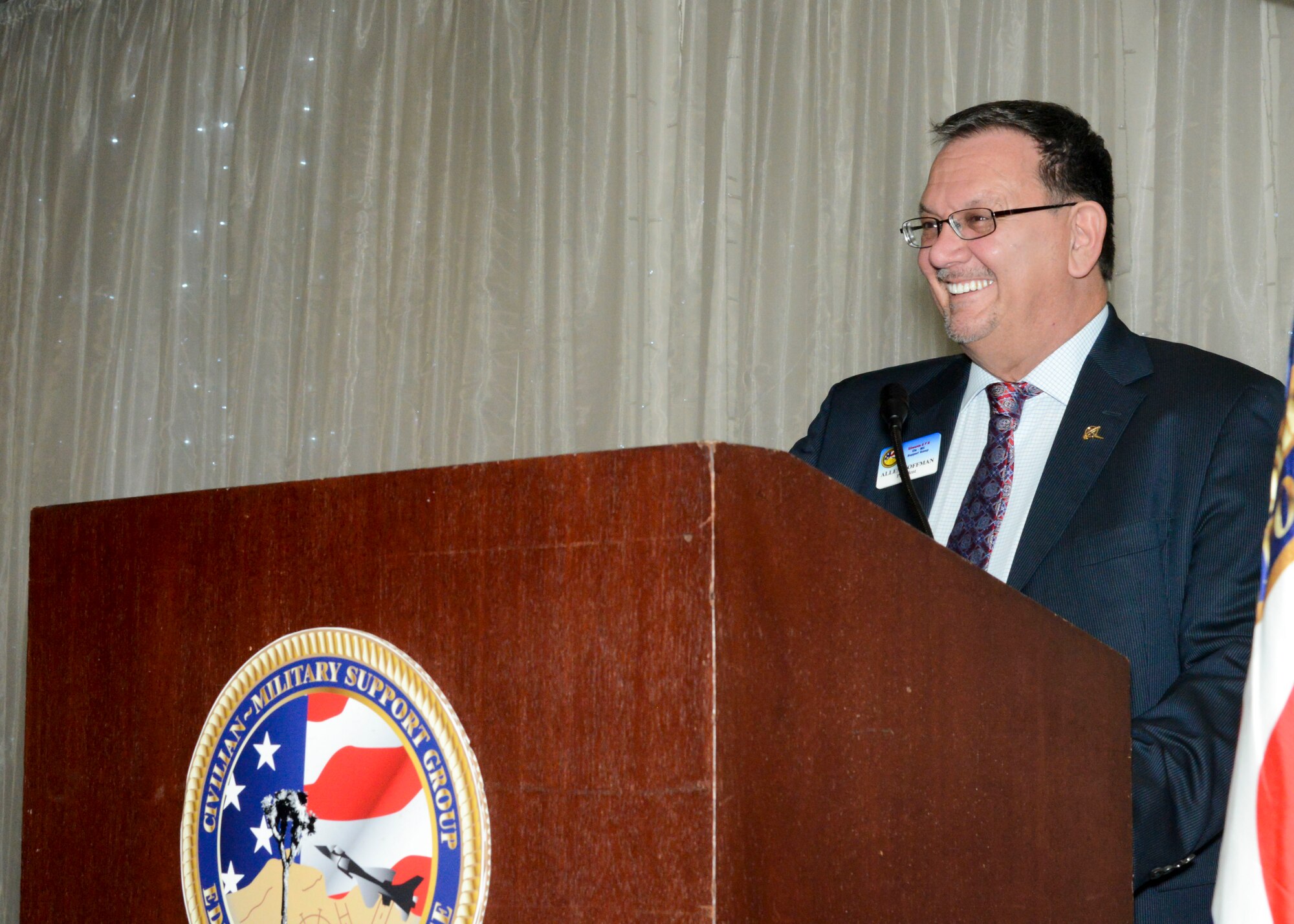Allen Hoffman, Edwards Air Force Base Civilian-Military Support Group president, addresses those in attendance at the Edwards AFB Civ-Mil’s Annual Installation of Officers and Directors dinner banquet at the University of Antelope Valley in Lancaster, California, Nov. 2. (U.S. Air Force photo by Giancarlo Casem)
