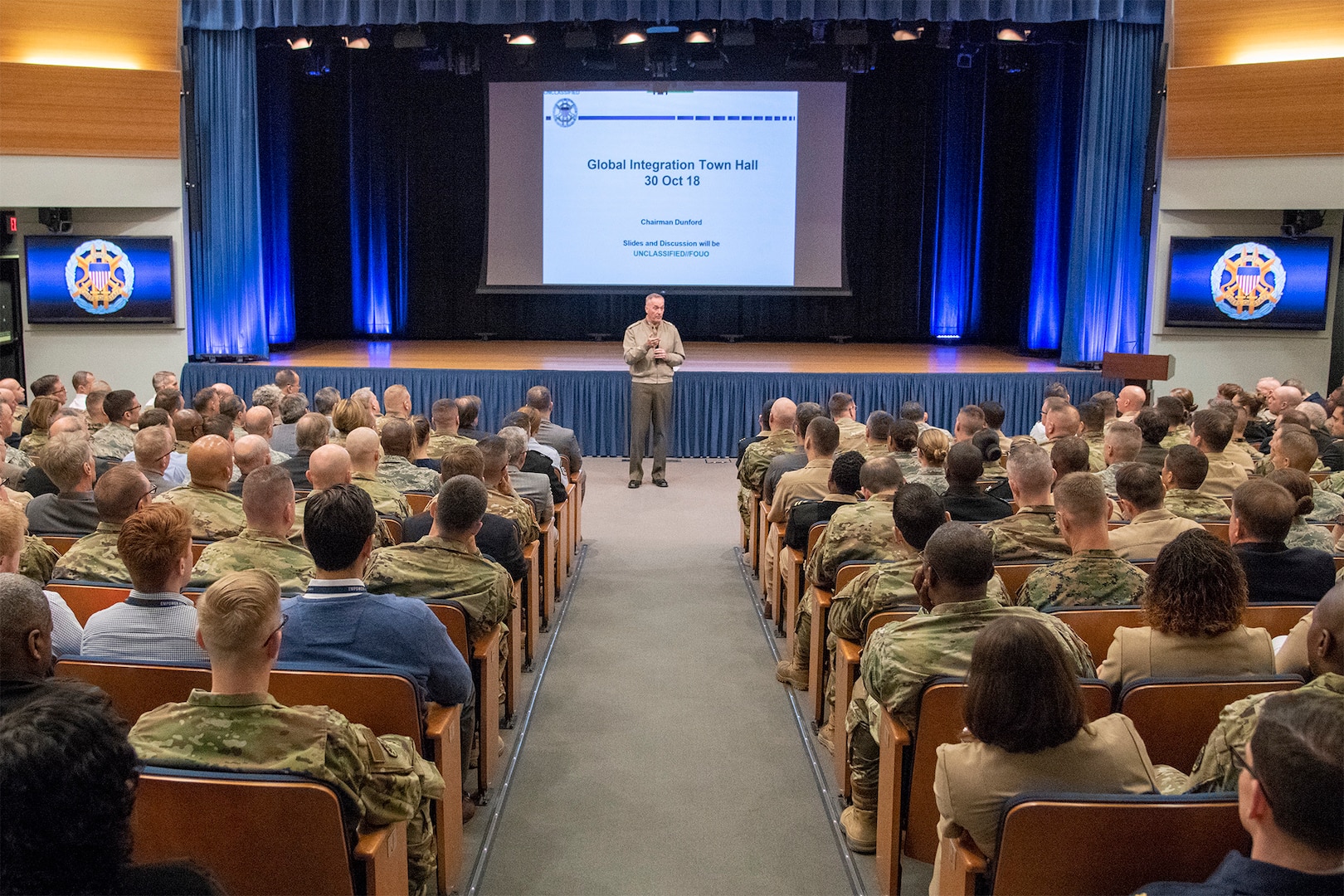 Chairman of the Joint Chiefs of Staff Gen. Joe Dunford hosts a town hall with members of the Joint Staff to discuss global integration and where they fit into this overarching concept in the Pentagon in Washington, D.C., Oct. 30, 2018.