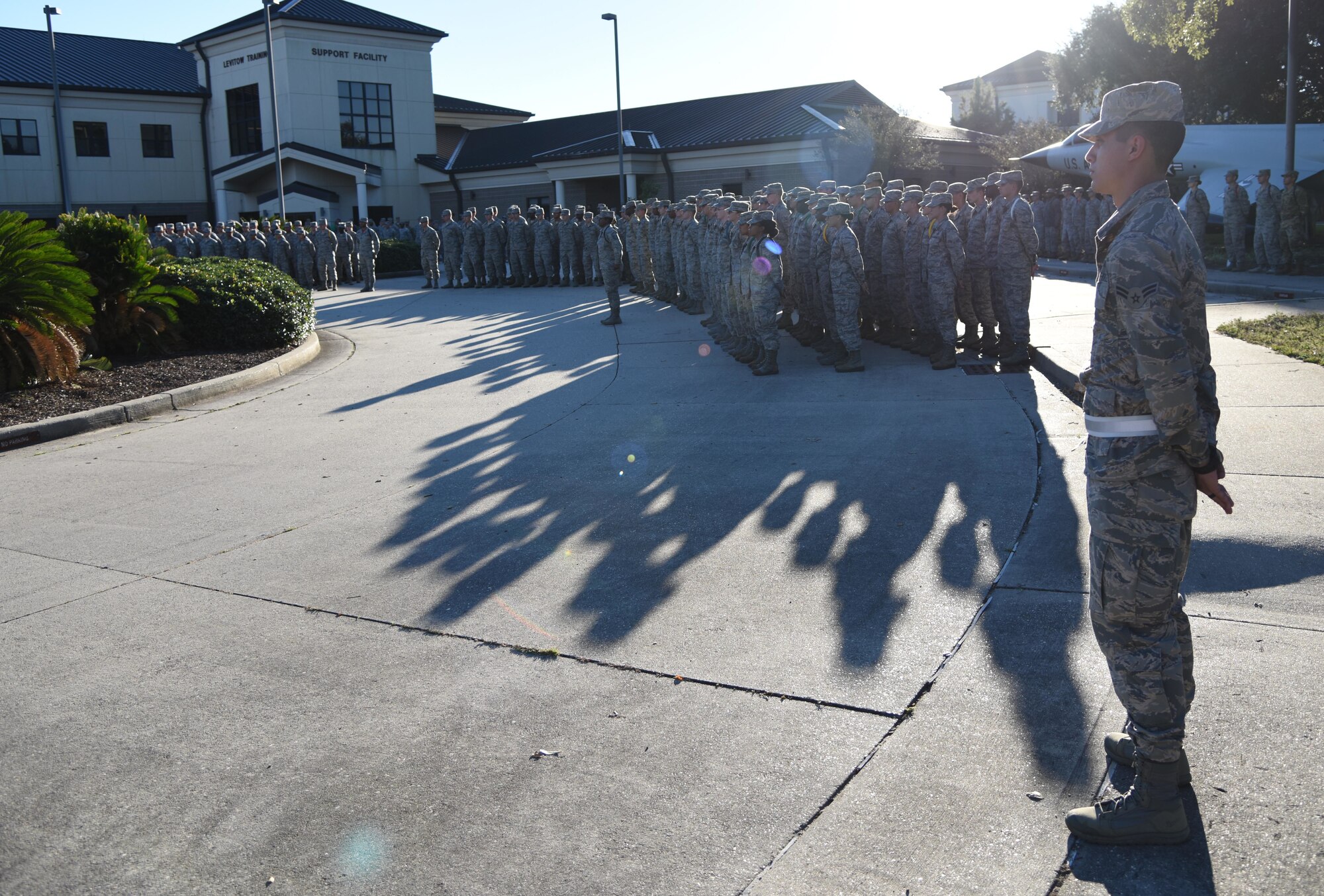 Keesler Airmen participate in a retreat ceremony to honor U.S. Air Force Chief Master Sgt. Kenneth Carter, 81st Training Wing command chief, for his retirement at Keesler Air Force Base, Mississippi, Nov. 2, 2018. Carter retired with more than 29 years of military service. (U.S. Air Force photo by Kemberly Groue)