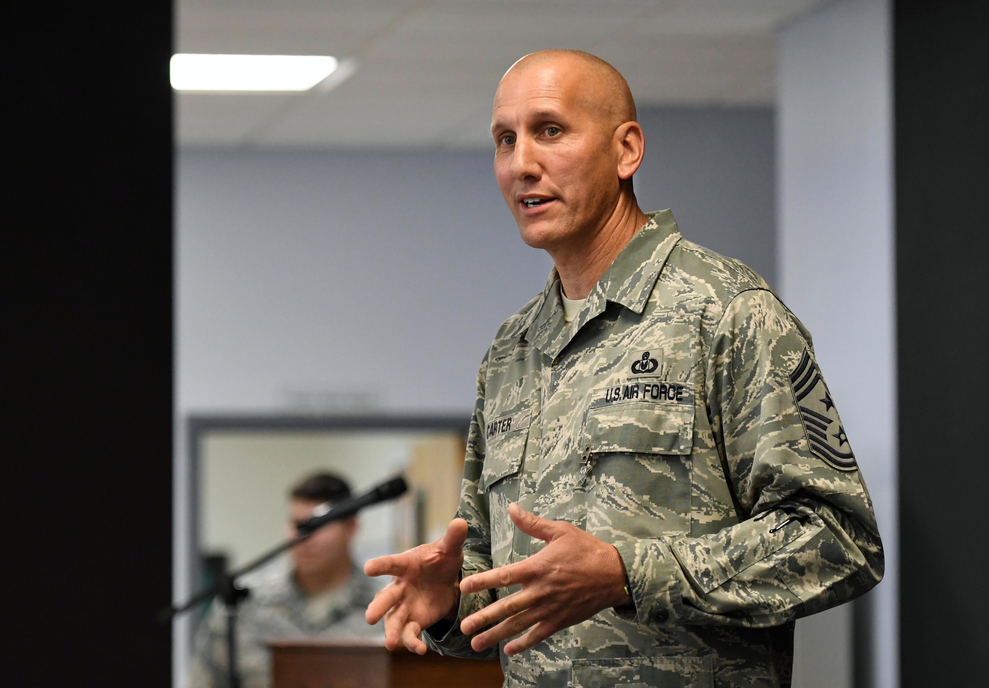 U.S. Air Force Chief Master Sgt. Kenneth Carter, 81st Training Wing command chief, delivers remarks during his retirement farewell reception at Keesler Air Force Base, Mississippi, Nov. 2, 2018. Carter retired with more than 29 years of military service. (U.S. Air Force photo by Kemberly Groue)