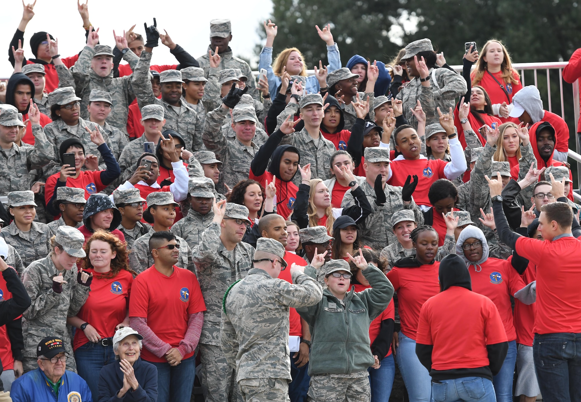 Members of the 335th Training Squadron display four fingers after being named the overall winner for the fourth quarter during the 81st Training Group drill down on the Levitow Training Support Facility drill pad at Keesler Air Force Base, Mississippi, Nov. 2, 2018. The 335th TRS "Bulls" also took first place for the year. (U.S. Air Force photo by Kemberly Groue)