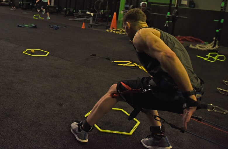 U.S. Air Force Staff Sgt. Tyler McGuire, 66th Training Squadron Survival Evasion Resistance Escape specialist, performs physical conditioning during his morning workout in Spokane Valley, Washington, Oct. 30, 2018. McGuire is preparing for his first Mixed Martial Arts world title match in Indonesia Nov. 17. (U.S. Air Force photo/Airman 1st Class Jesenia Landaverde)